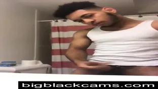 Straight light-skinned black man stroking his cock